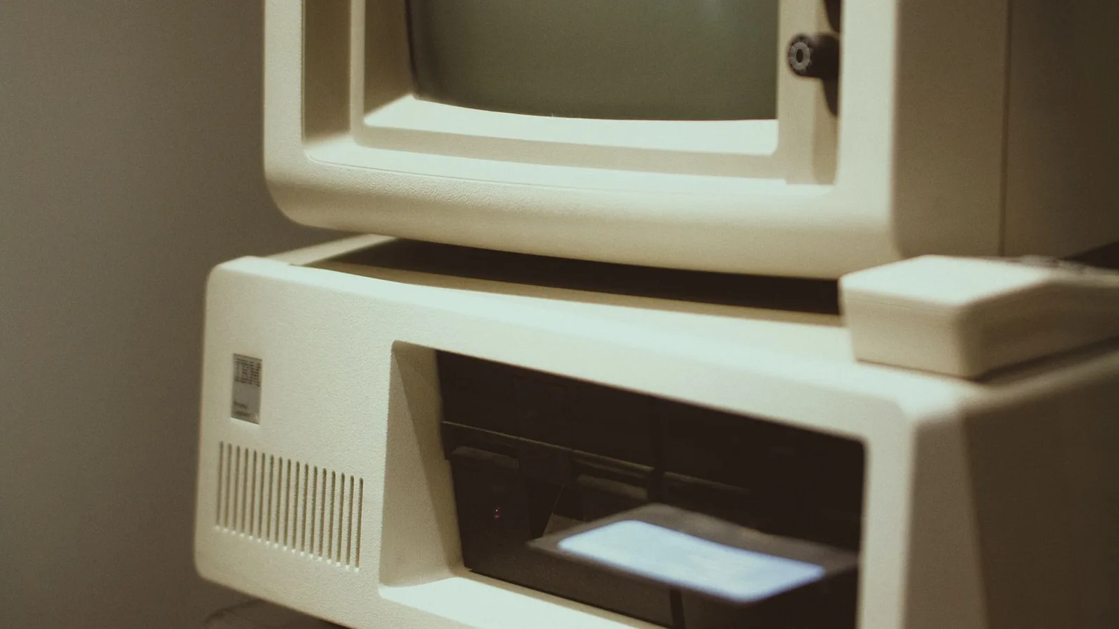 Old desktop computer and CRT monitor set aside for computer disposal and e-waste recycling in Dubai