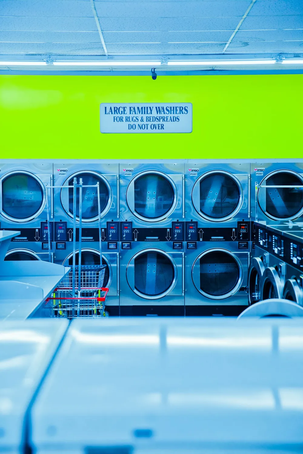 Row of front-load tumble dryers representing tumble dryer disposal and laundry equipment collection in Dubai
