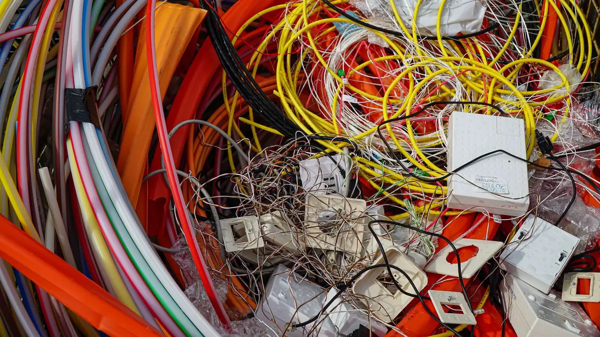Cables and electronic components sorted for electronic waste recycling and materials recovery in Dubai