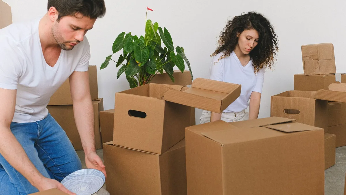 Household items boxed and ready for a residential junk pickup in a Dubai home