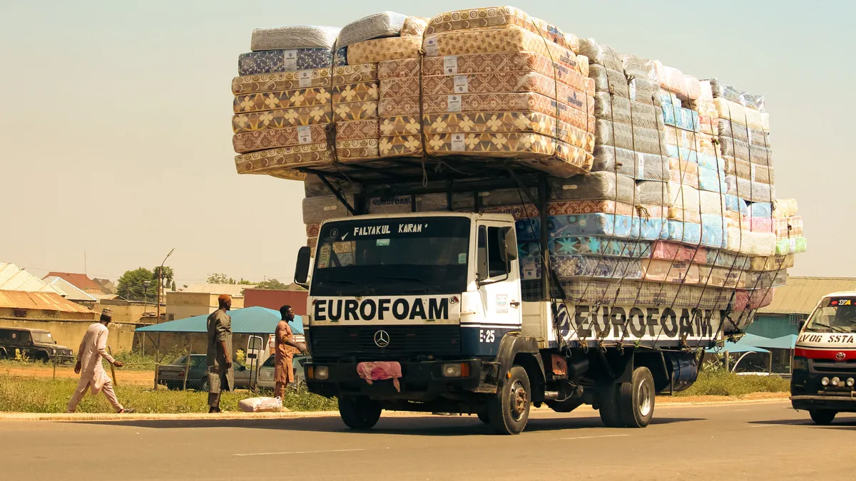 Stacked old mattresses collected for recycling and responsible disposal, illustrating eco-friendly mattress recycling in Dubai