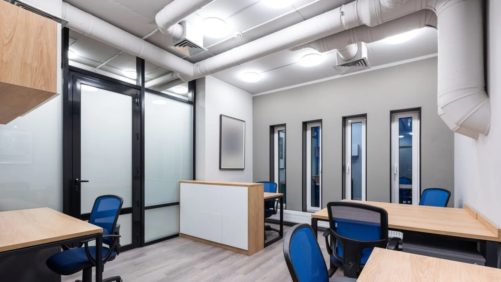 Modern Dubai office with desks, chairs and storage units cleared during office furniture removal