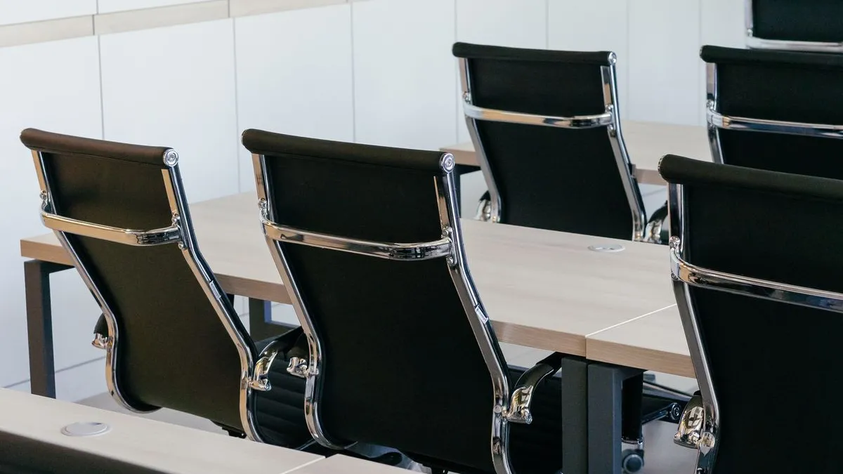 Conference room with a meeting table and chairs in a Dubai office prepared for commercial furniture removal
