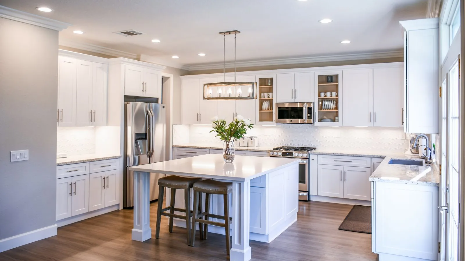 Modern Dubai kitchen with a stainless steel refrigerator ready for professional refrigerator removal