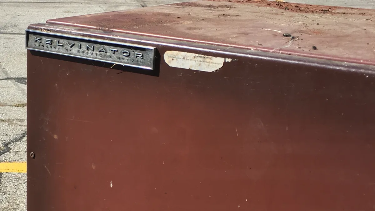 Old refrigerator set aside for collection and responsible old refrigerator disposal in Dubai