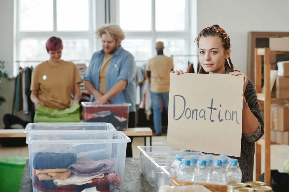 Usable household items sorted into boxes for donation and reuse during a Dubai rubbish removal and clearance