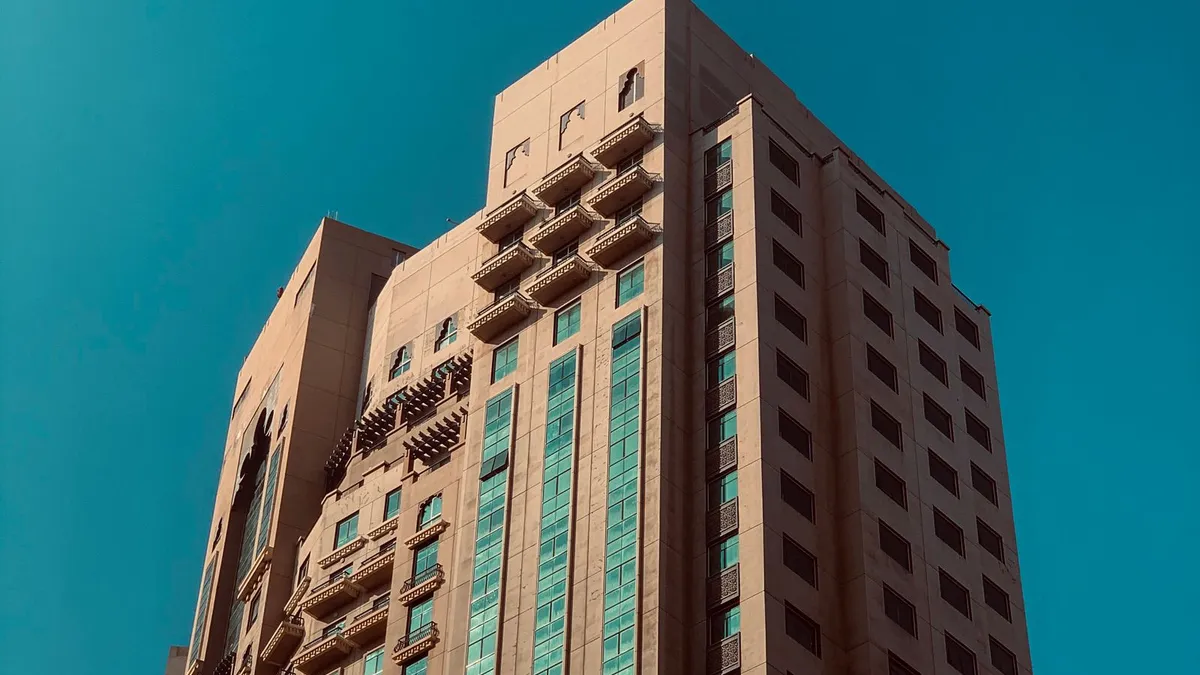 High-rise residential tower in Dubai where service-lift access affects same day junk removal timing