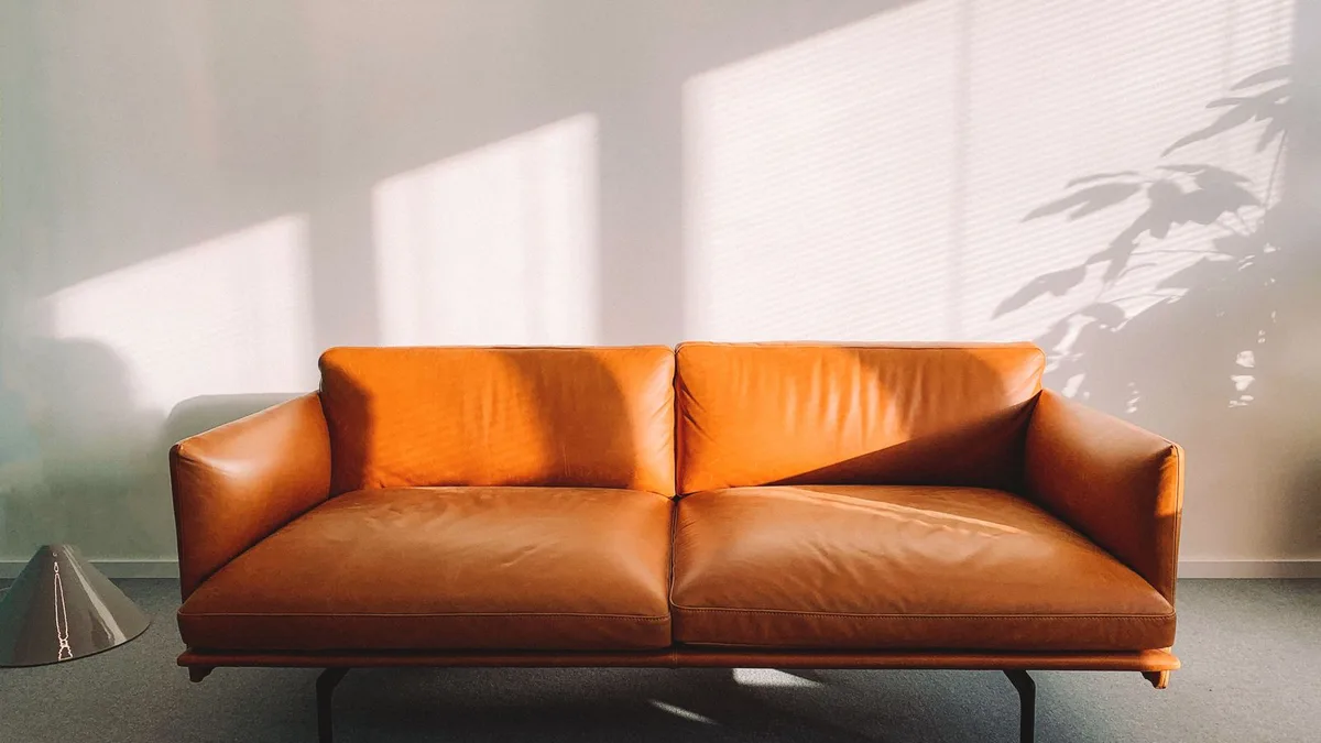 Clean tan leather couch in good condition suitable for donation or resale during used sofa disposal in Dubai