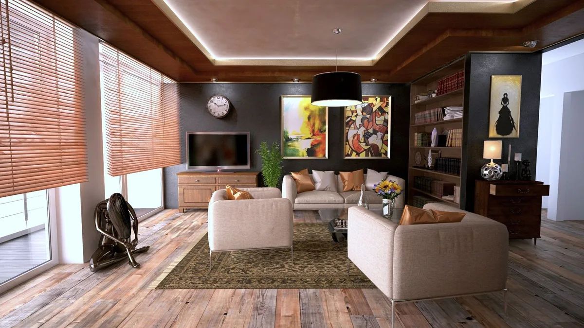 Spacious Dubai villa living room with sofas and armchairs being cleared during villa sofa removal