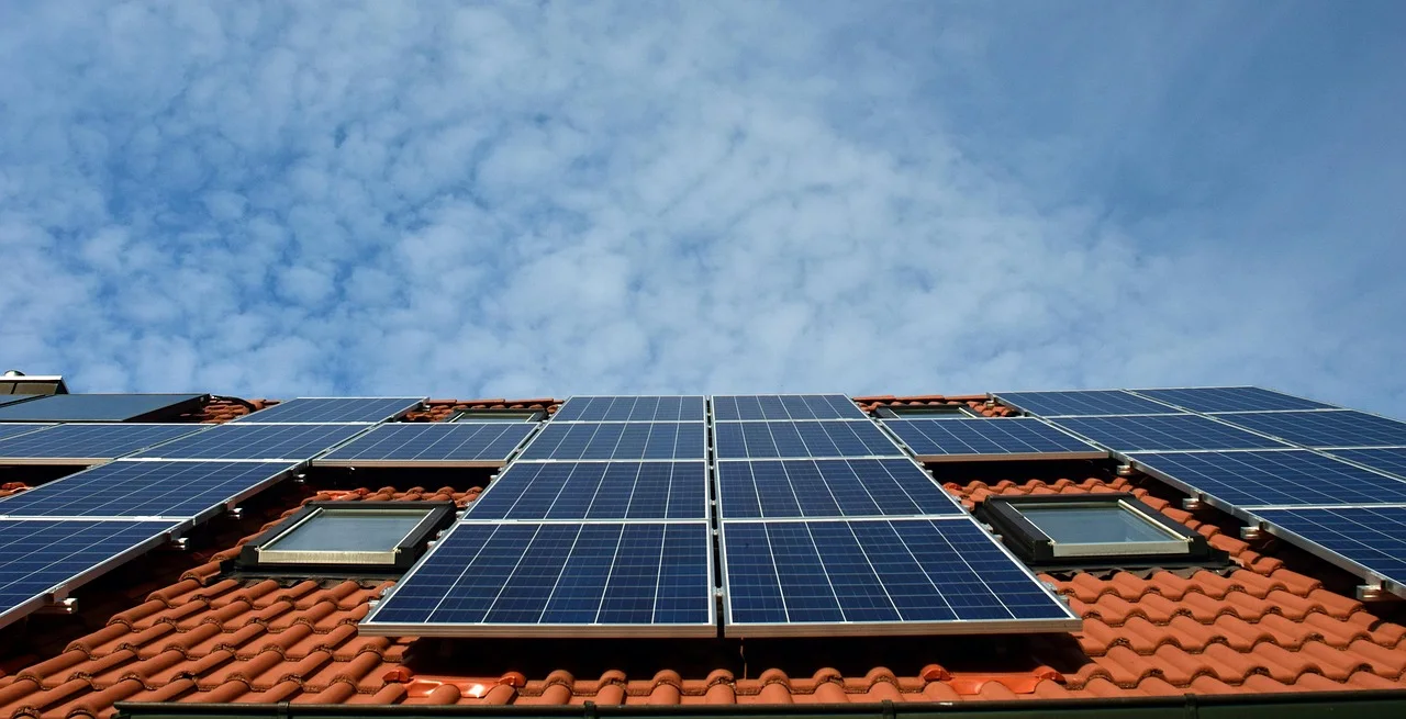 Rooftop photovoltaic solar panels on residential Dubai villa undergoing decommissioning and replacement