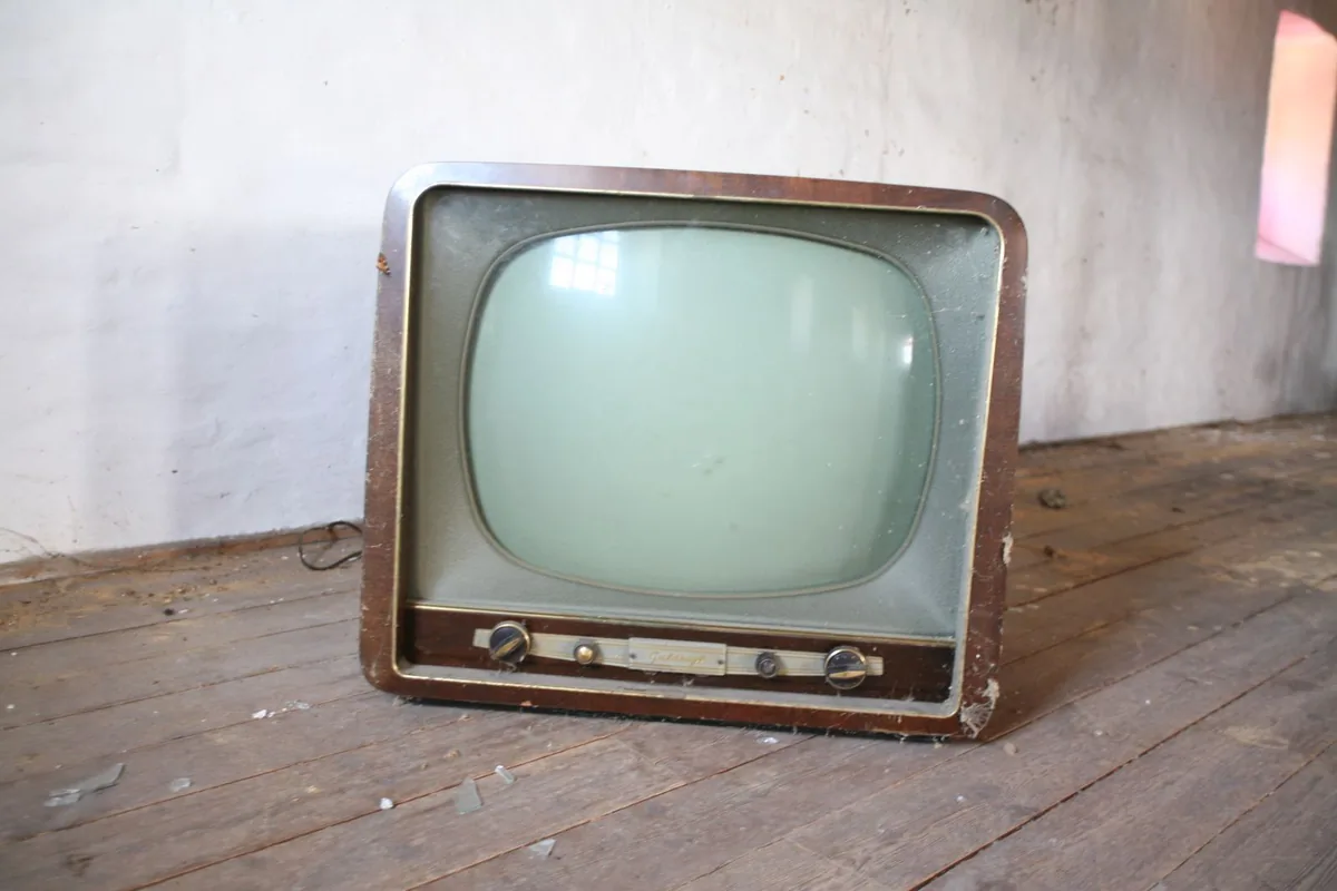 Old television left in an empty room ready for responsible TV disposal and television recycling in Dubai