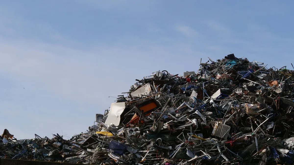 Large pile of scrap metal from a warehouse cleanout set aside for recycling in Dubai