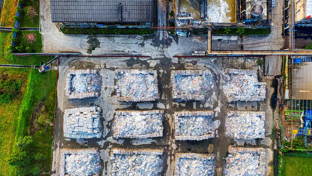 Aerial view of a recycling and recovery facility in Dubai where collected waste is processed and baled for recycling